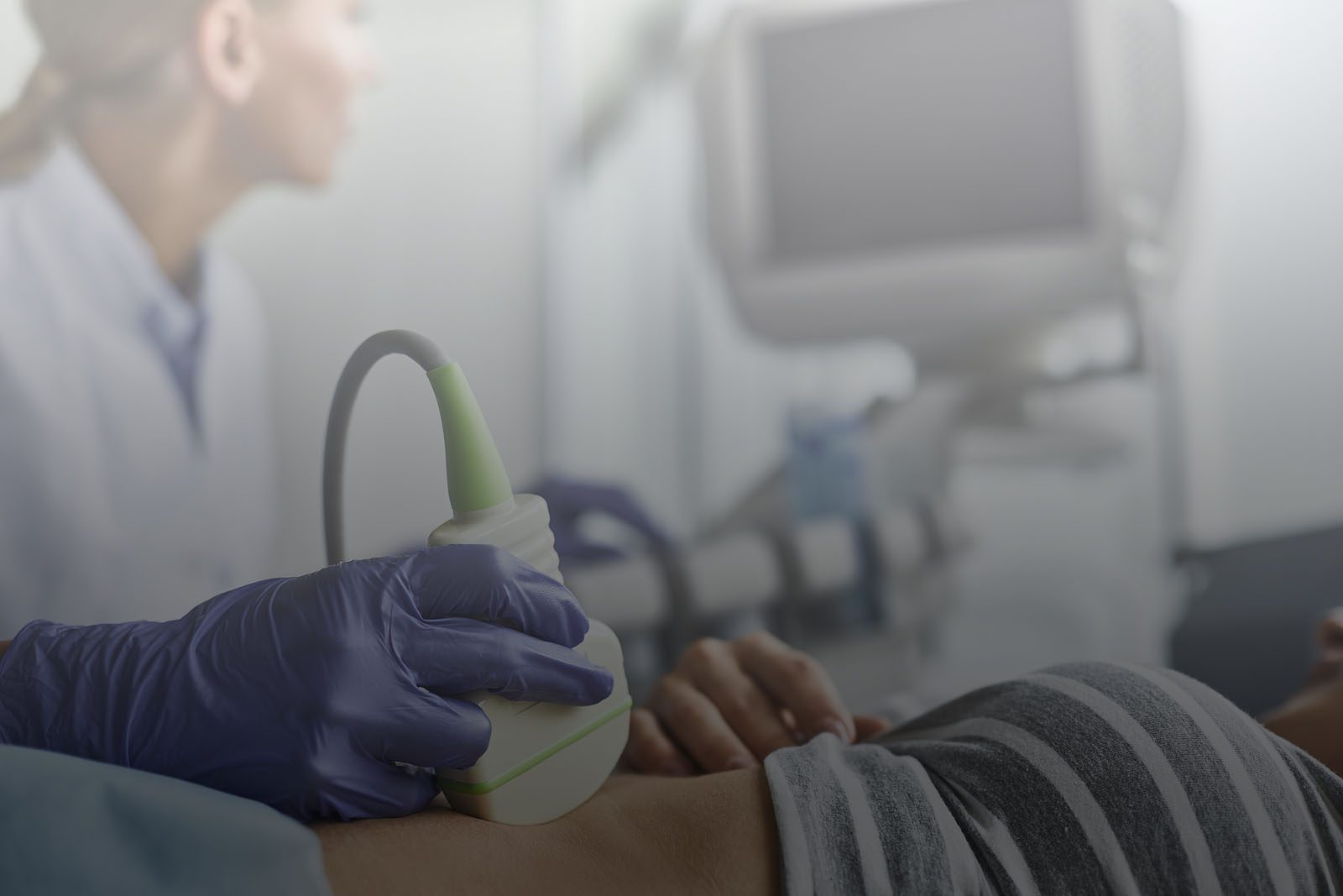 Doctor giving an ultrasound at Thrive Women's Clinic in Orlando, FL